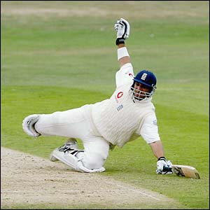 England's Mark Butcher dives as he successfully avoids a run-out