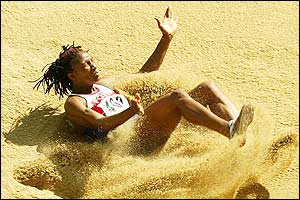 Britain's Denise Lewis moves up to sixth in the heptathlon