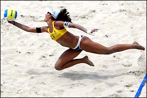 Ana Paula of Brazil dives to try and retrieve the ball against Germany in the beach volleyball world championships held in Rio de Janeiro