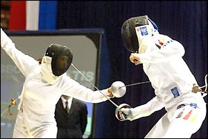 Russian fencer O Ermakova (left) lunges at German opponent I Duplitzer in the women's epee final at the world fencing championships in Cuba