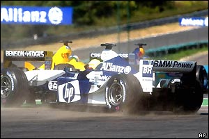 Ralf Schumacher spins on the opening lap sending him to the back