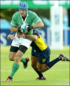 David Humphreys is pulled down by Romania's 