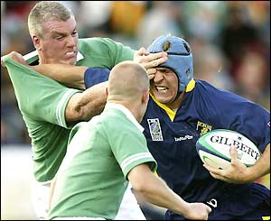 Ovidiu Tonita runs into teh Irish defence