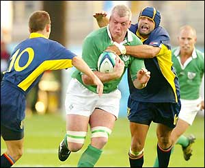 Victor Costello burst through to score a try for Ireland