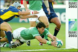 Shane Horgan dives over the line to score a try for Ireland