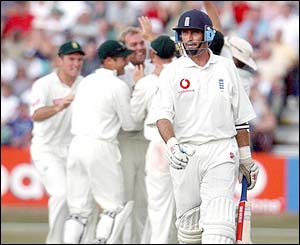 England's Nasser Hussain walks from the crease
