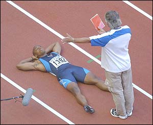 America's John Drummond lies on the track