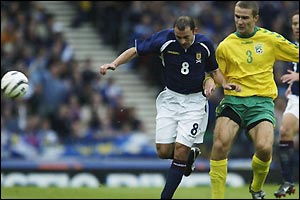 Colin Cameron fends off an attacker