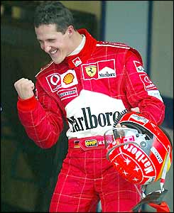 Michael Schumacher celebrates his world title victory