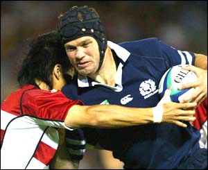 Stuart Grimes breaks through a Japanese tackle