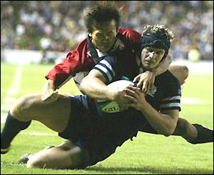Simon Taylor scores a try for Scotland
