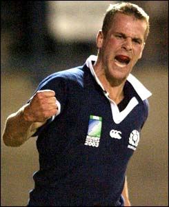 Chris Paterson celebrates his second try