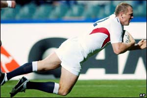 Mike Tindall goes over for the first try 