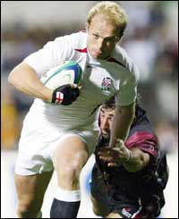 Matt Dawson darts over to score England's second try