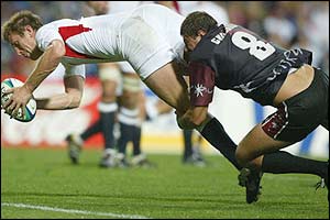 Will Greenwood goes over for his second try 