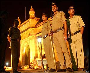 Bombay policemen stand guard before the Gateway of India