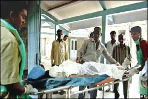 Overwhelming casualties meant bodies were left in corridors at the St. George Hospital in Bombay, India