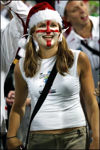 An England supporter watches the match against Georgia