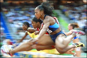 Canada's Perdita Felicien wins her 100m heat as Gail Devers misses out on a place in the final 
