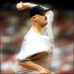 New York Yankees' David Wells pitches a ball