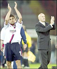 Dundee's players applaud their fans at the final whistle