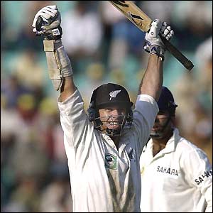 Mark Richardson of New Zealand celebrates reaching his hundred
