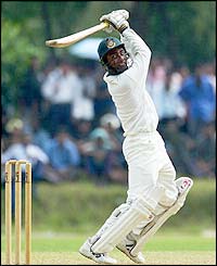 Bangladesh A batsman Nafis Iqbal watches his shot head towards the boundary