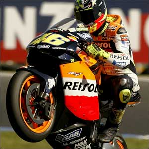Valentino Rossi of Italy and the Repsol Honda Team celebrates the fastest time during first qualifying for the Skyy Vodka Australian Motorcycle Grand Prix 