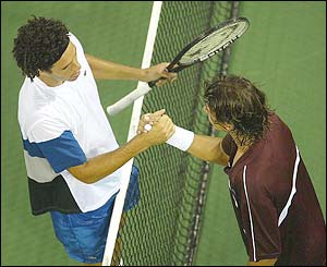 James Blake celebrates victory over Armenian Sargis Sargsian