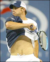Andy Roddick plays a forehand