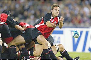 Canada's Sean Fauth plays a pass out of a ruck