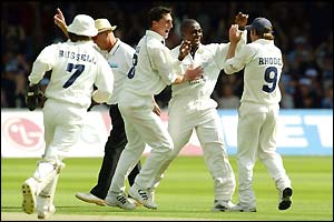 Gloucestershire players celebrate after Vikram Solanki is run out by Jonty Rhodes