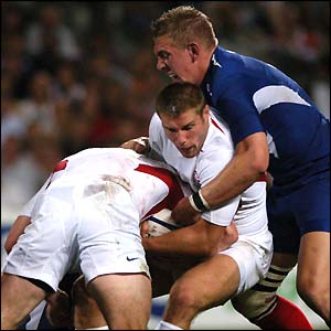 England's Josh Lewsey is stopped in his tracks by the French defence
