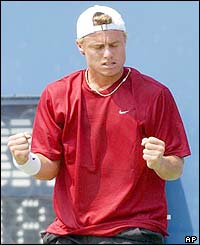 Australia's Lleyton Hewitt celebrates winning a point