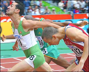 Algeria's Djabir Said-Guerni dips ahead of Russia's Yuriy Borzakovskiy to win the 800m