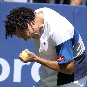 Morocco's number 22 seed Younes El Aynaoui takes on the Czech Republic's number 10 seed Jiri Novak