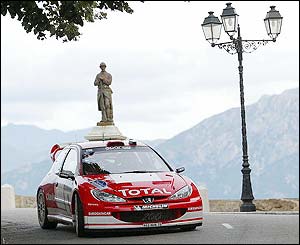 World champion Marcus Gronholm races in the Rally of Corsica 
