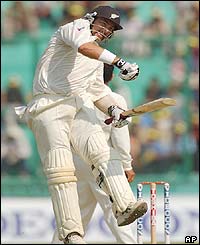 New Zealand's Craig McMillan celebrates scoring a century