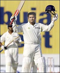 India opener Virender Sehwag celebrates his century