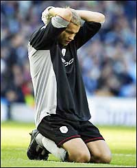Bolton goalie Jussi Jaaskelainen reacts after the match