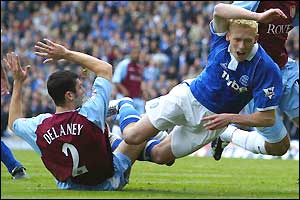 Delaney trips Forsell in the area