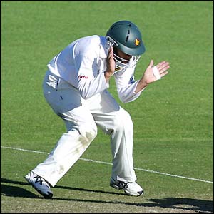 Zimbabwe's Stuart Carlisle ducks to avoid a six