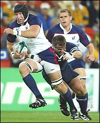 Dave Hodges makes a break for the USA against Scotland