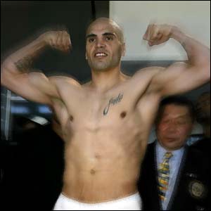 Anthony Mundine of Australia weighs in for his fight with Antwun Echolls 