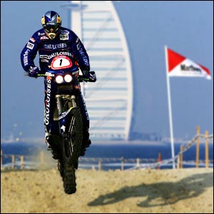 Cyril Despres, riding a KTM bike, attempts to consolidate his lead in the world championships during the first stage of the UAE Desert Classic in Dubai