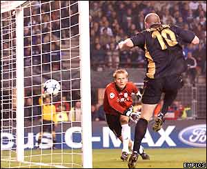 John Hartson puts the ball in the net but his goial is disallowed