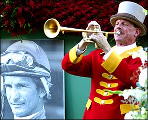 A trumpeter plays the familiar pre-race theme at the start of the memorial ceremony for William Lee Shoemaker at Santa Anita Park, California 