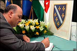 Representative of the Palestinian embassy in Bosnia, Majed Maarout, signs a condolence book for Alija Izetbegovic 