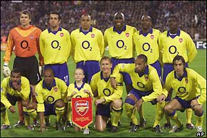 The Arsenal squad pose for photos before the match
