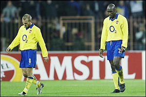 A dejected Arsenal react after Dynamo Kiev score the first goal